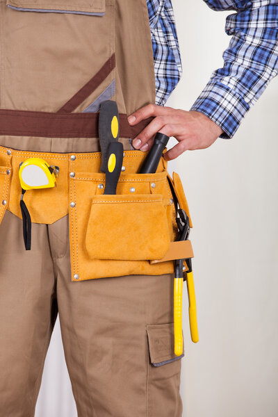 Repairman Wearing Tool Belt
