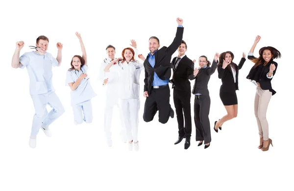 Doctors and managers jumping — Stock Photo, Image
