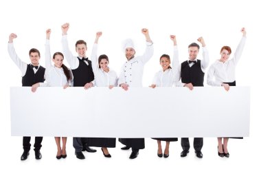 Cheerful excited catering staff showing banner clipart