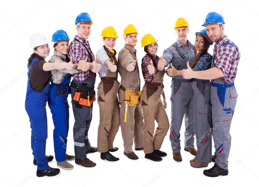 Diverse group of workmen giving a thumbs up