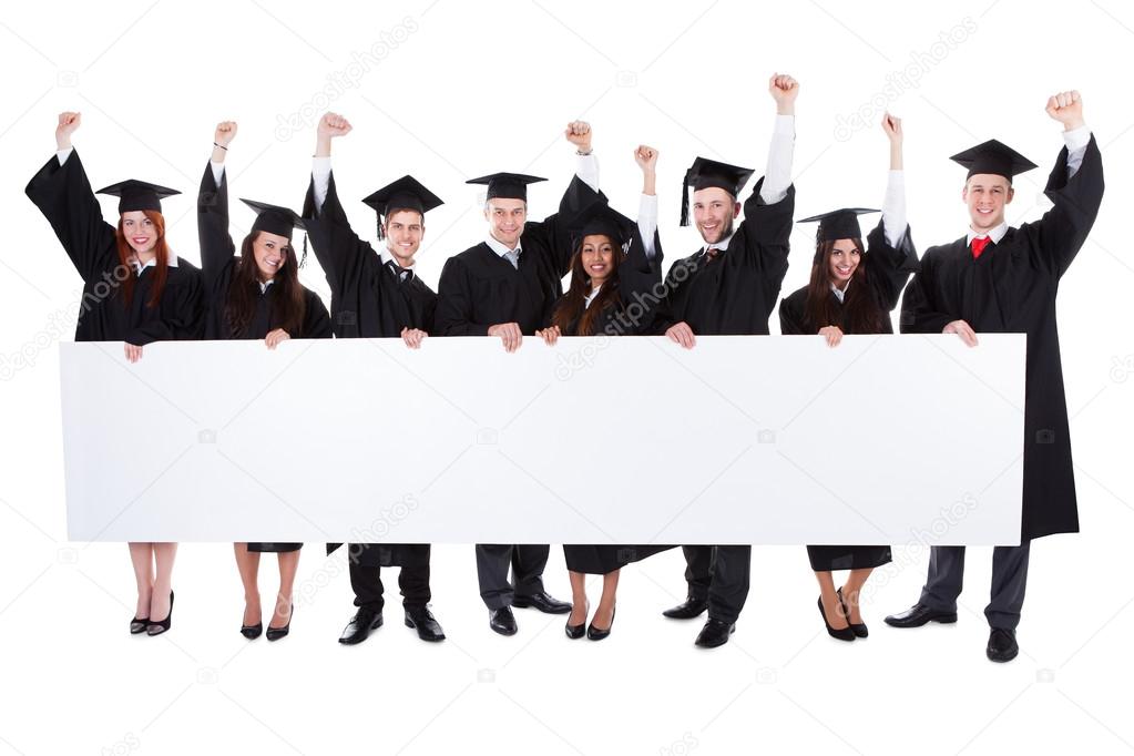 Cheerful excited graduate students showing empty banner