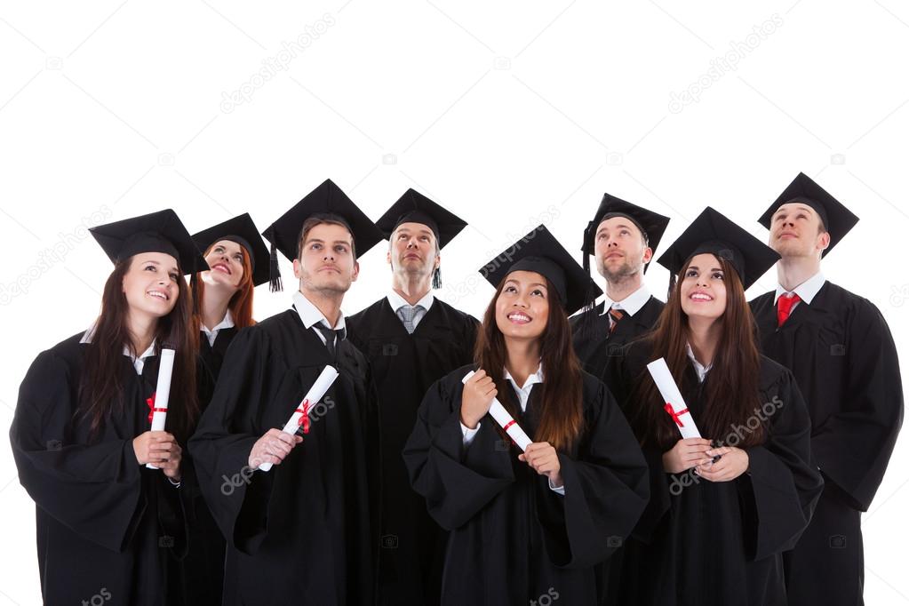 Happy smiling group of multiethnic graduates