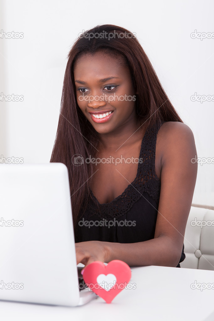 Woman Dating Online On Laptop At Home