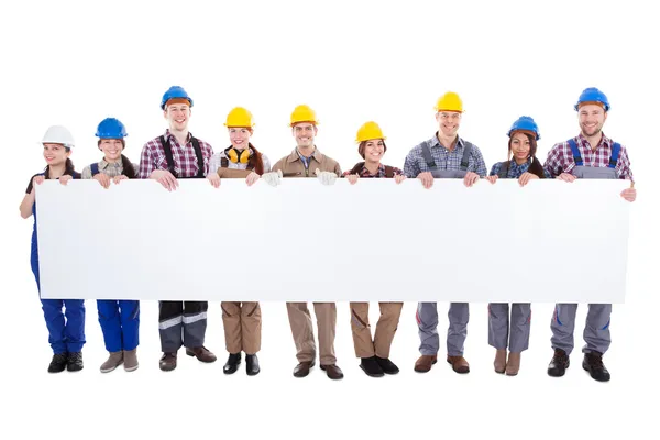 Gruppe von Arbeitern mit einem Banner — Stockfoto