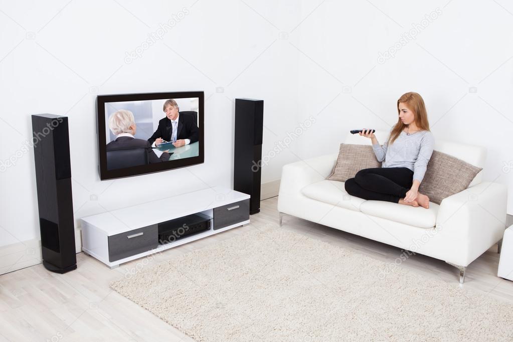 Woman Watching Movie On Television