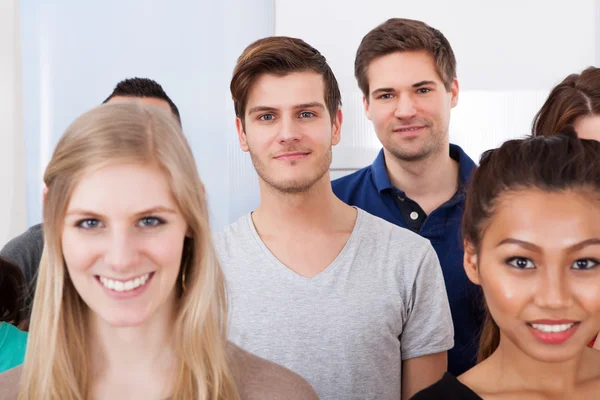 Portrait Of College Students Standing In Classroom — Stock Photo, Image