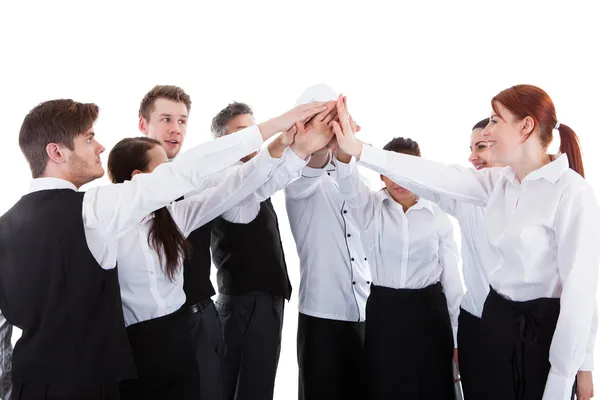 Cateringmedewerkers hoge vijf gebaar maken — Stockfoto