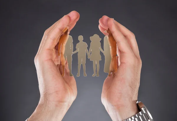 Hands Protecting Metal Family — Stock Photo, Image