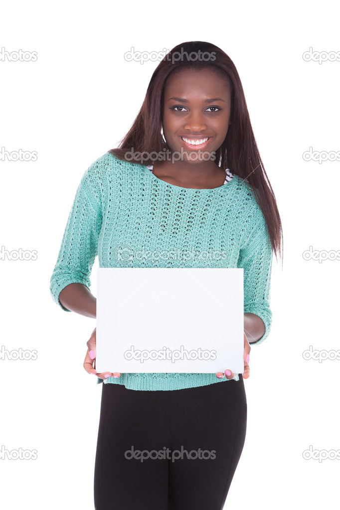 Woman holding blank placard against white background