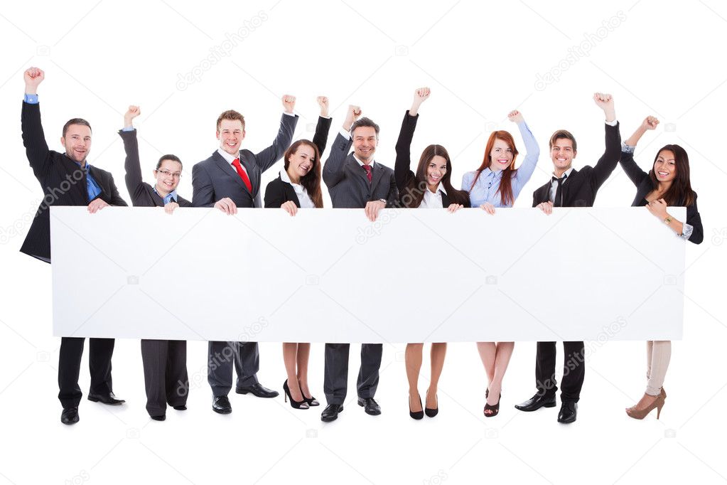 Large group of excited businesspeople presenting banner