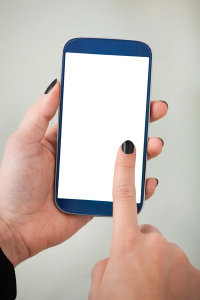 Affärskvinnas hand innehav smartphone — Stockfoto