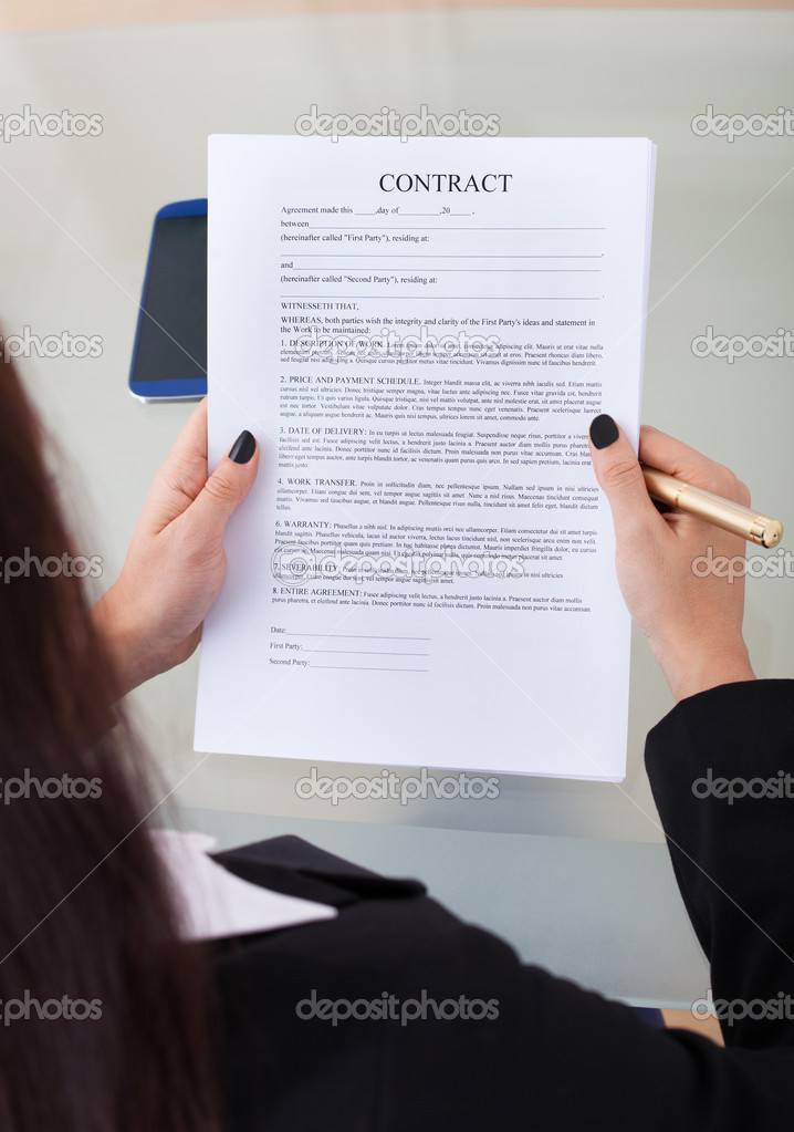 Businesswoman Holding Contract Papers
