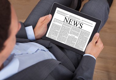 işadamı Office dijital tablet haber okuma
