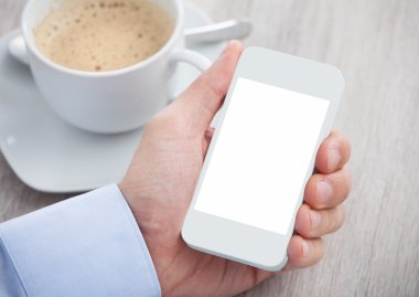 işadamı el cep telefonu boş ekran ile tutarak