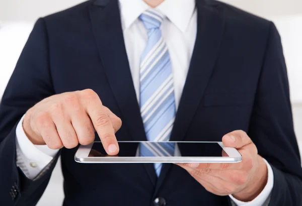 Businessman Using Digital Tablet In Office — Stock Photo, Image