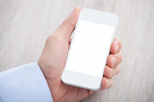 Celular de mano de hombre de negocios con pantalla en blanco —  Fotos de Stock