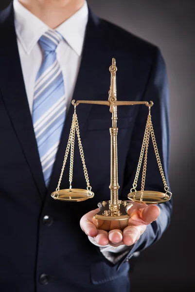 Businessman Holding Justice Scale — Stock Photo, Image