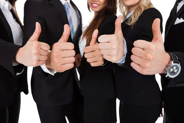 Empresários Gesturing Thumbs Up — Fotografia de Stock