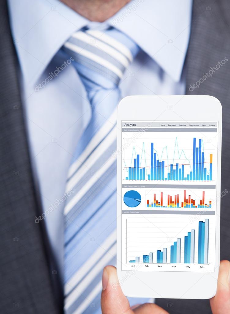 Businessman Showing Graphs On Smartphone