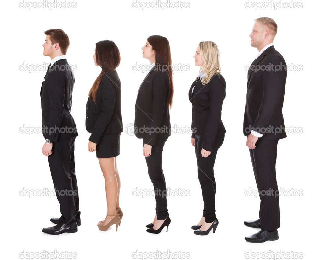 Welldressed Businesspeople Standing In A Line