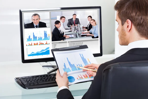Businessman Video Conferencing With Colleagues — Stock Photo, Image