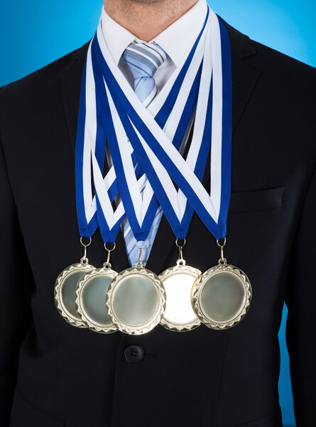 Midsection Of Businessman Wearing Medals