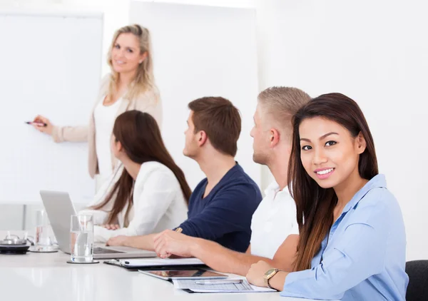 Smiling Businesswoman With Colleagues — Stock Photo, Image