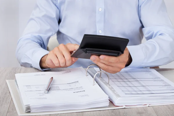 Businessman Calculating Financial Expenses — Stock Photo, Image