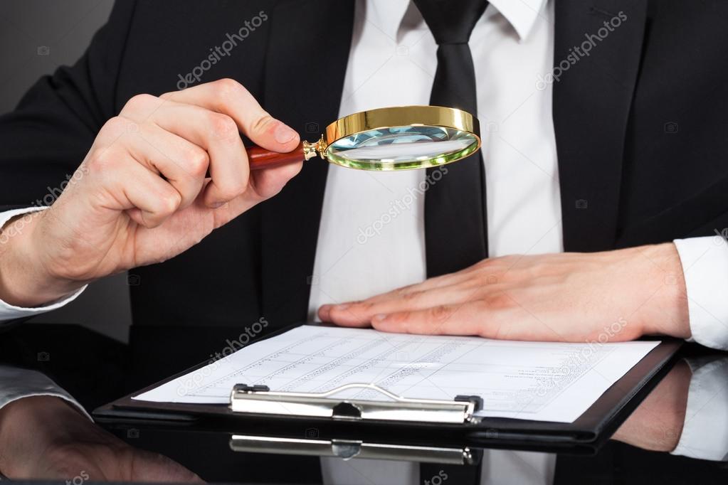 Businessman Analyzing Document