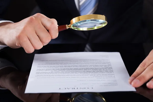 Businessman Examining Contract Paper — Stock Photo, Image