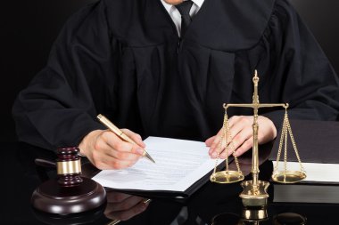 Judge Writing On Paper clipart