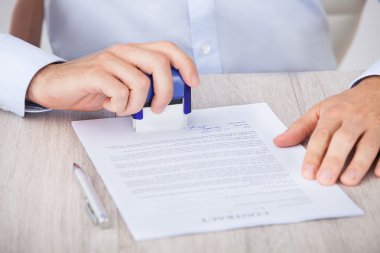 işadamı damgalama sözleşme kağıt