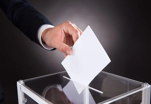 Businessman Inserting Ballot In Box — Stock Photo, Image