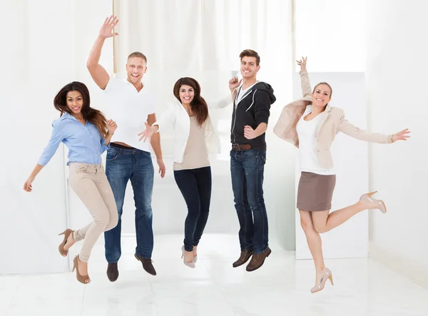 Successful Welldressed Businesspeople With Arms Raised — Stock Photo, Image