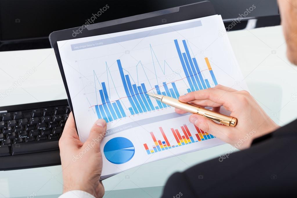 Businessman Analyzing Graphs