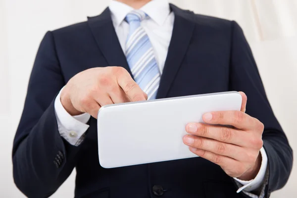 Businessman Using Digital Tablet In Office — Stock Photo, Image