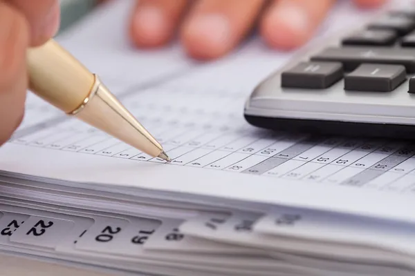 Businessman Checking Expense In Office — Stock Photo, Image