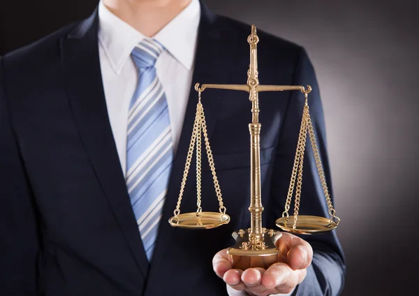 Businessman Holding Justice Scale — Stock Photo, Image