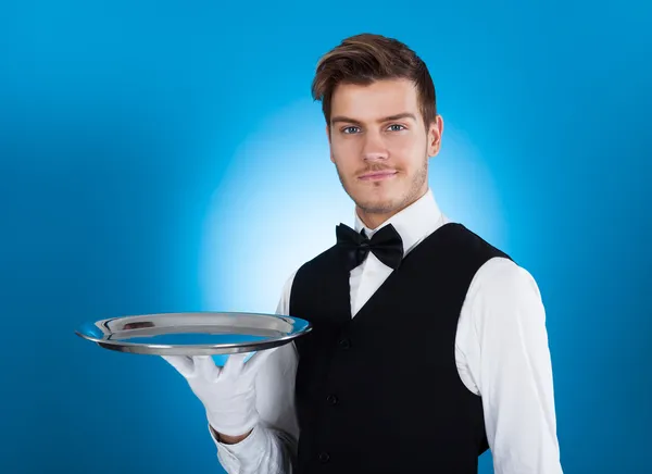 Confident Waiter Carrying Tray — Stock Photo, Image