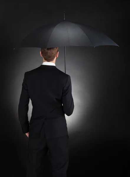 Businessman With Umbrella — Stock Photo, Image