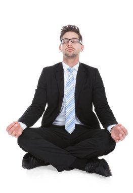 İşadamı meditasyon yapıyor