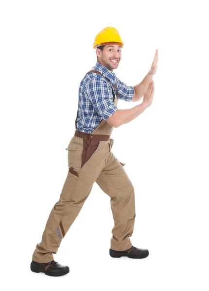 Manual Worker Pushing Billboard — Stock Photo, Image