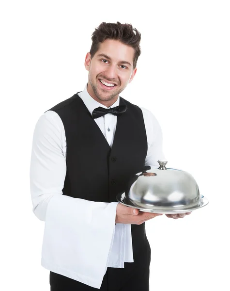 Confident Waiter Holding Domed Tray — Stock Photo, Image