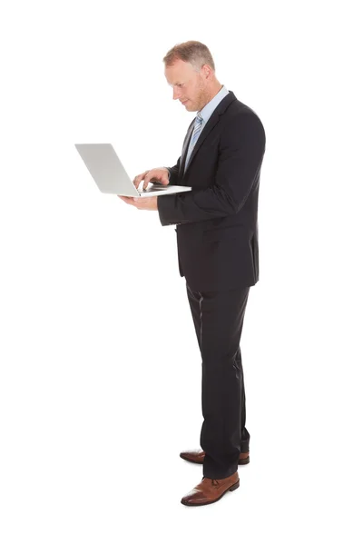 Businessman Holding Laptop — Stock Photo, Image