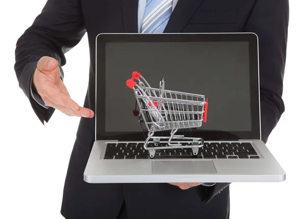 Businessman With Laptop And Cart — Stock Photo, Image