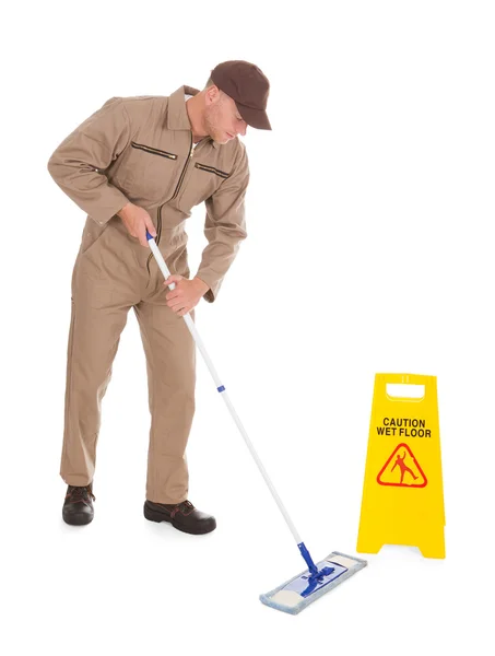 Male Servant Mopping Floor — Stock Photo, Image