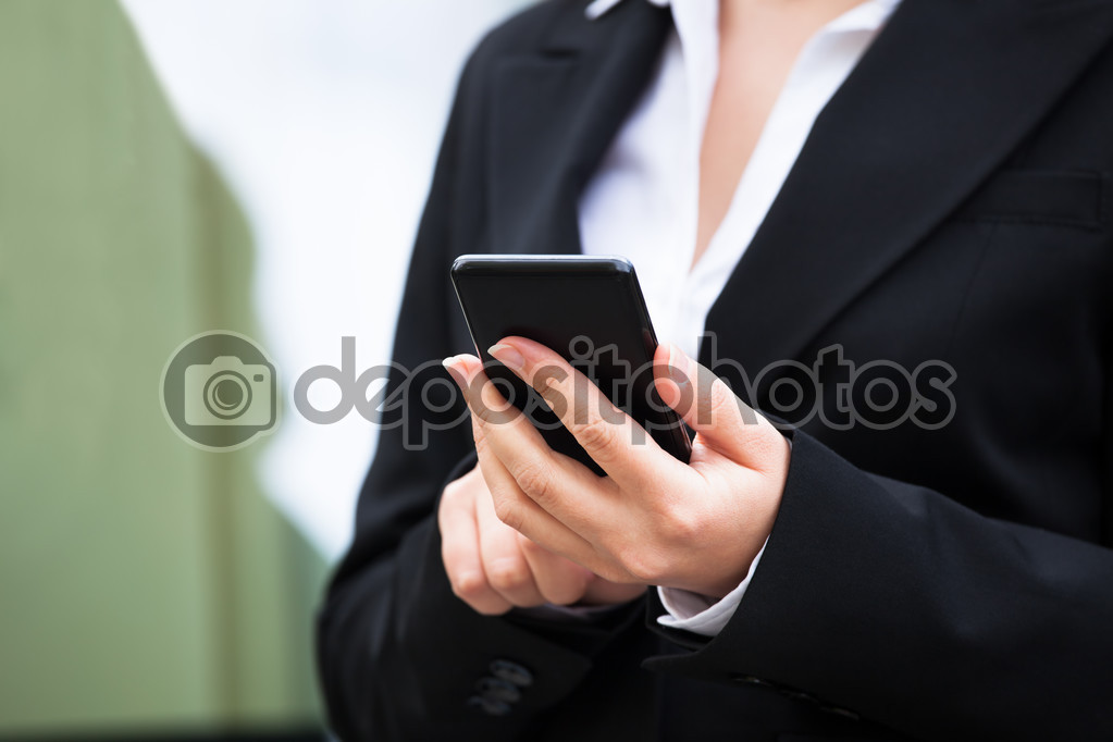 Businesswoman Using Smartphone