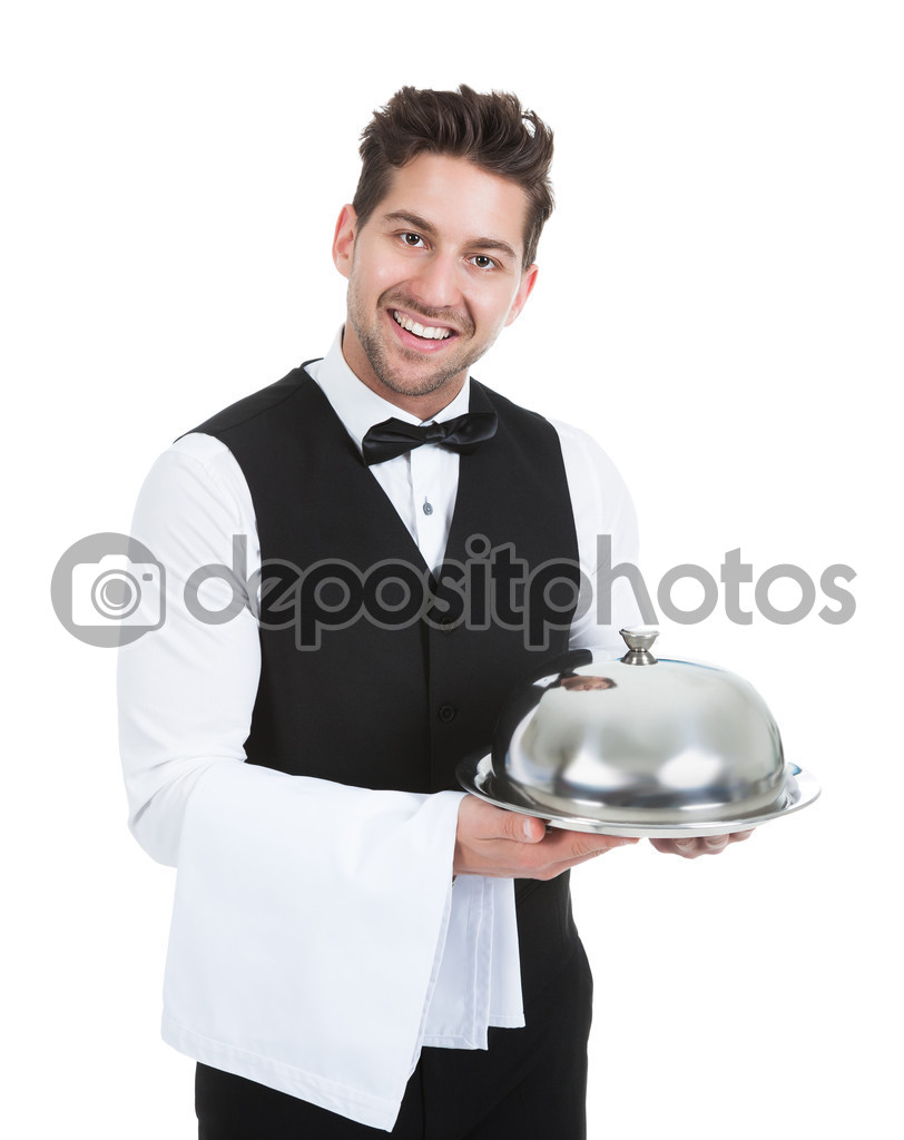 Confident Waiter Holding Domed Tray