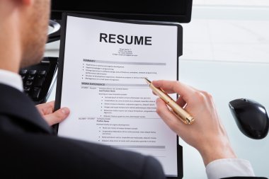 Businessman Analyzing Resume