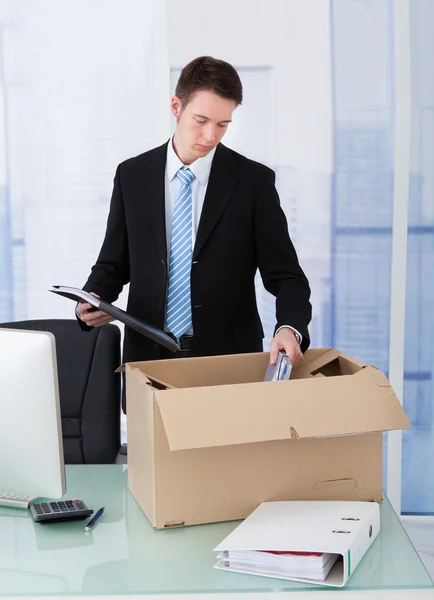 Businessman Collecting Office Supply — Stock Photo, Image